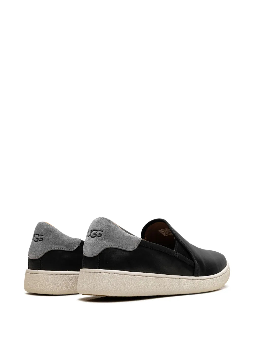UGG black slip-on sneakers, rear view with UGG logo on heel and white sole