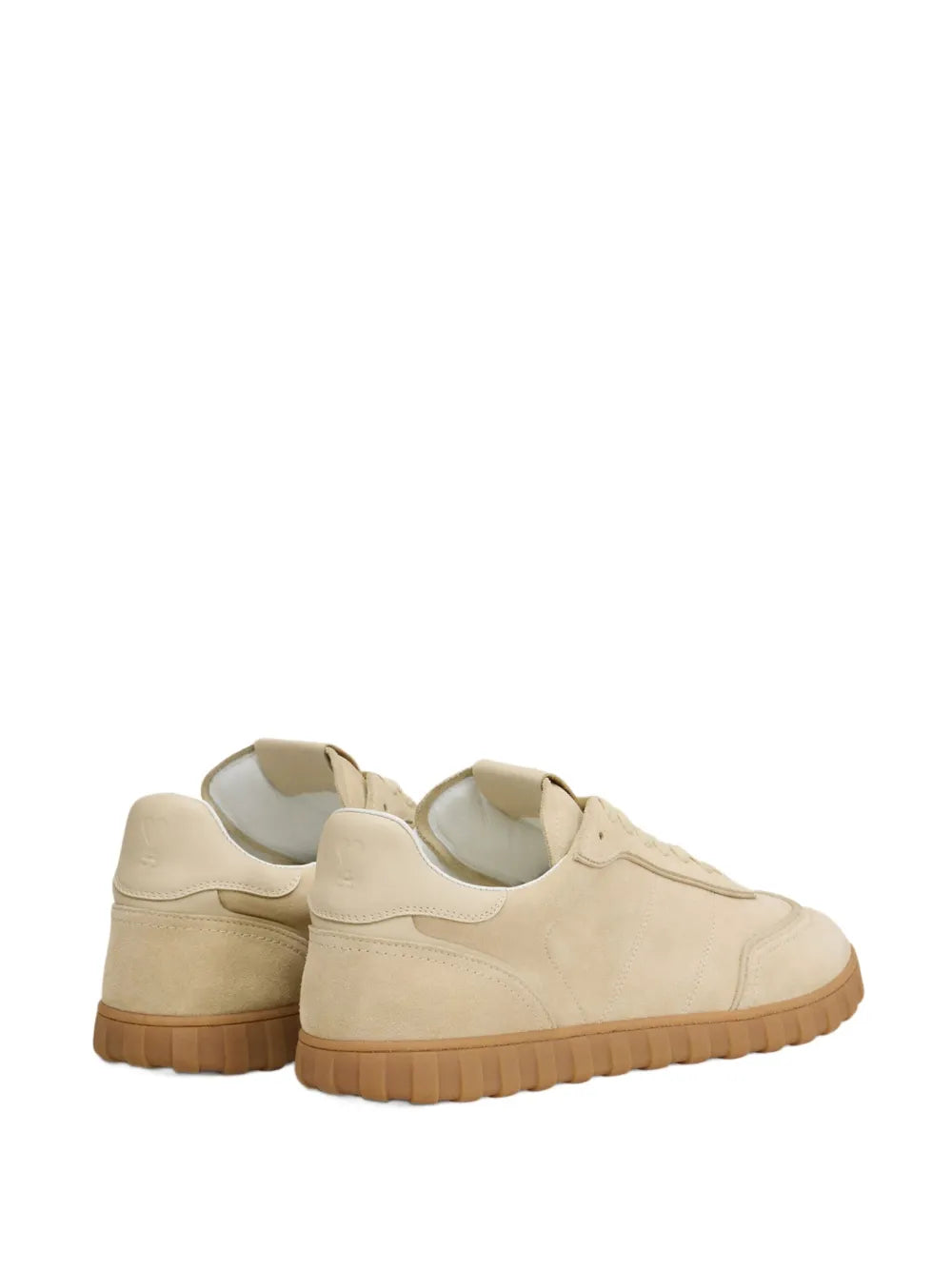 Light beige lace-up sneakers, back and side view with heel tab