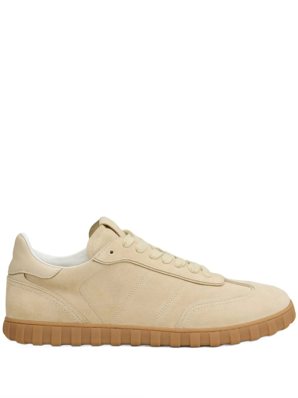 Light beige lace-up sneakers with chunky rubber sole and stitched overlays