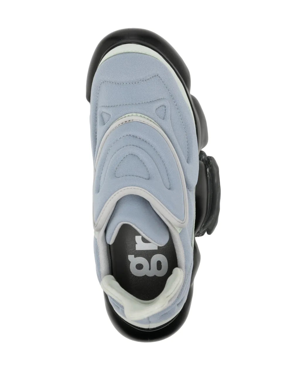 Light blue sneaker front with black sole and '8b' logo on insole