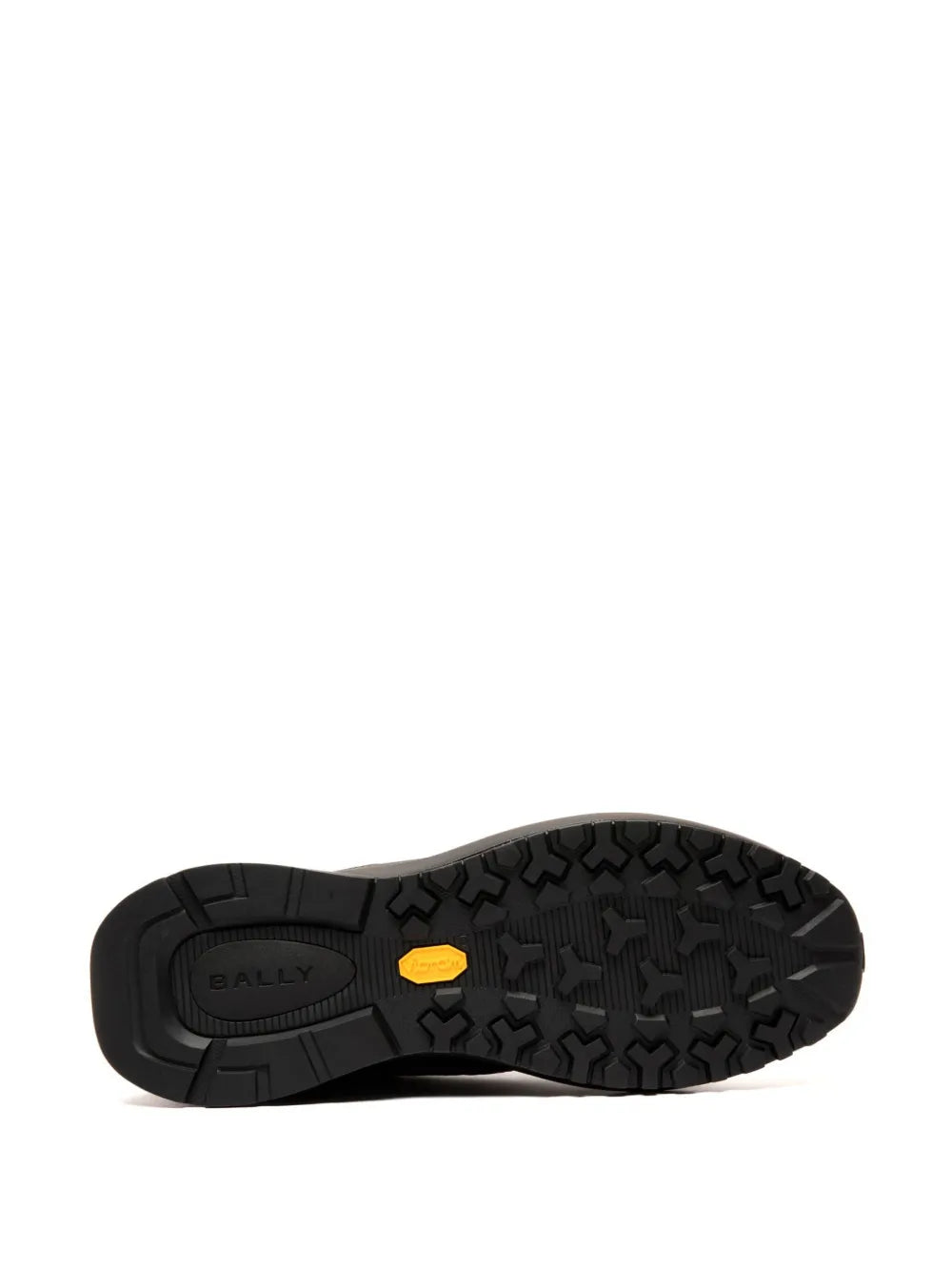 Bally black sneaker outsole with textured tread and yellow logo mark