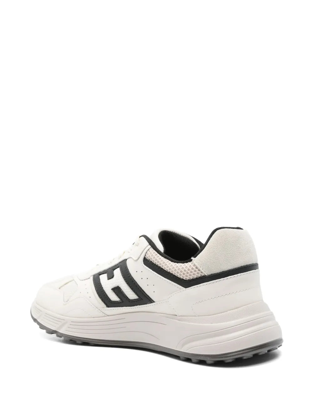 Light beige sneakers with black heel collar and side H logo