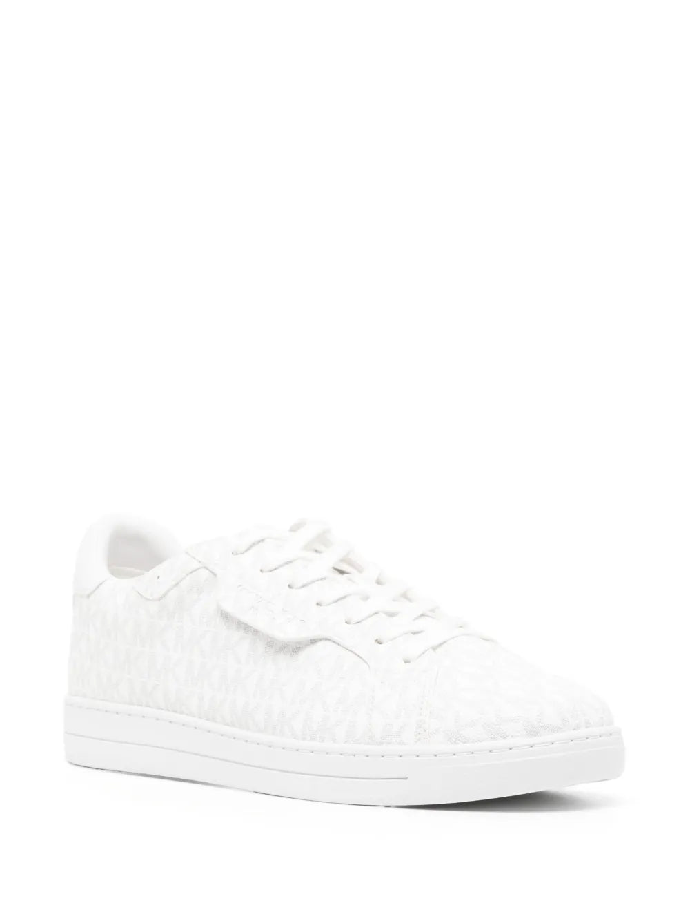 White sneakers side view with lace-up closure and MK logo monogram upper