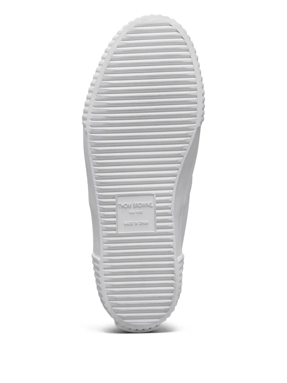 White high-top sneaker outsole with horizontal tread pattern