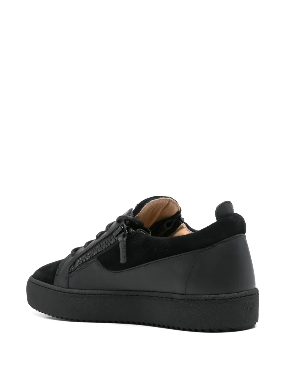 Black low-top sneakers with lace-up front, heel tab, and side zipper panel