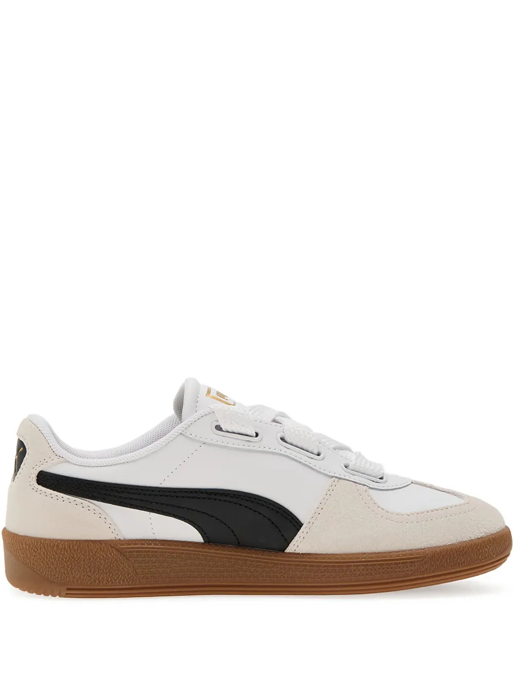 PUMA low-top sneaker in white with black side stripe and gum sole