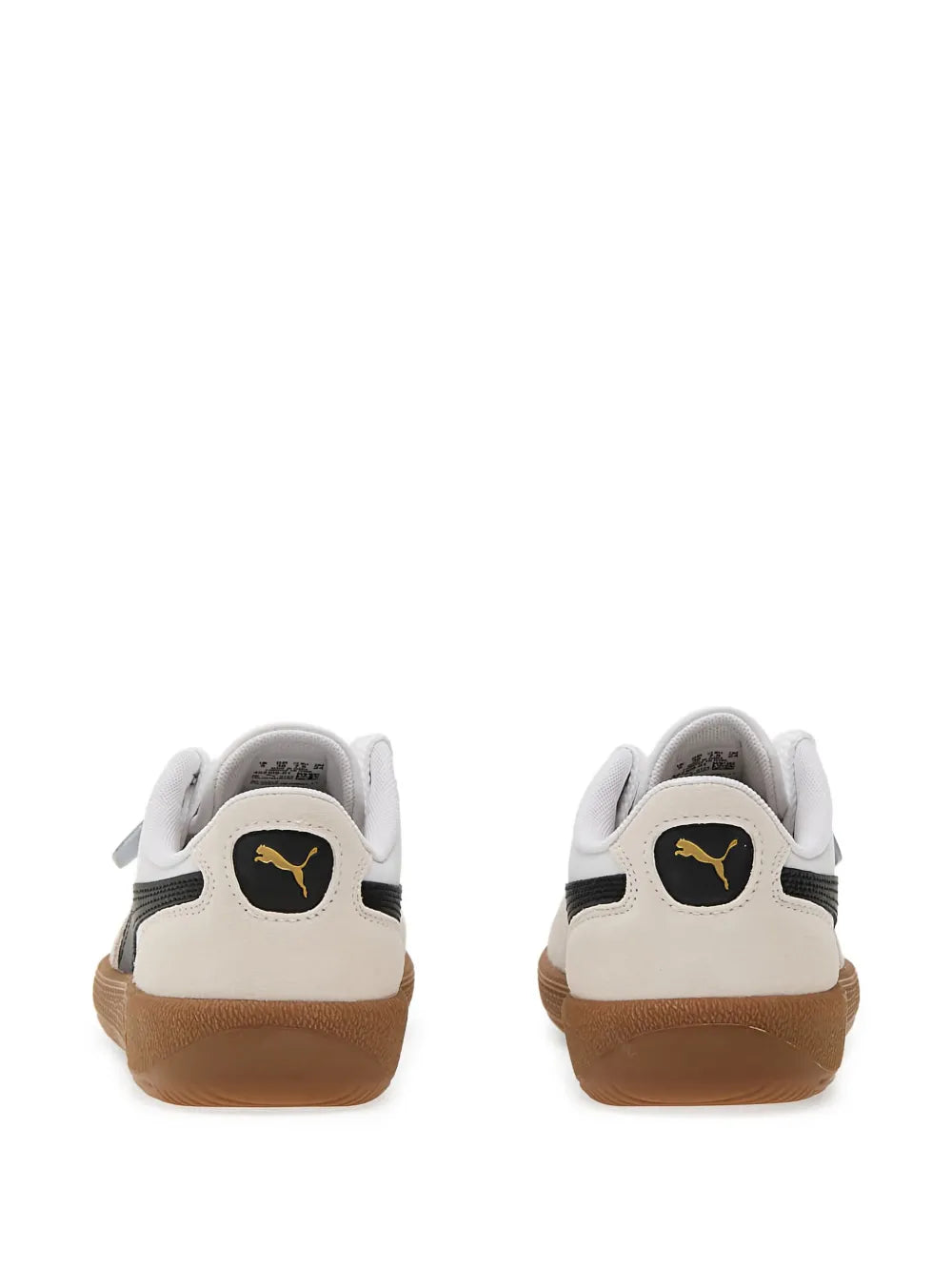 PUMA low-top sneaker back view, black heel panel with white upper and gum sole