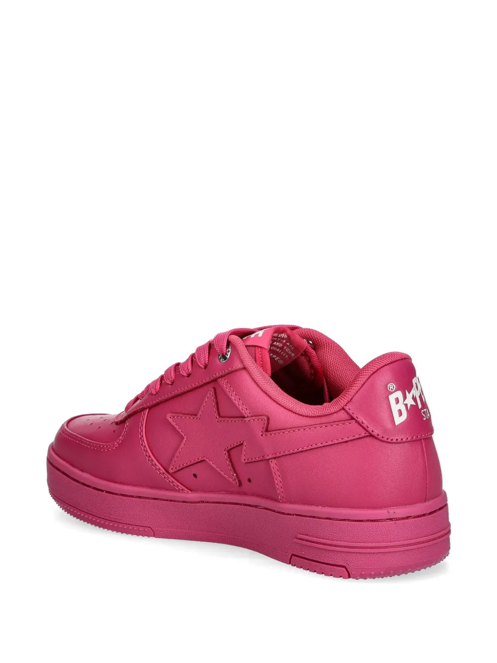 Pink low-top sneakers with BAPE heel patch and lace-up star design
