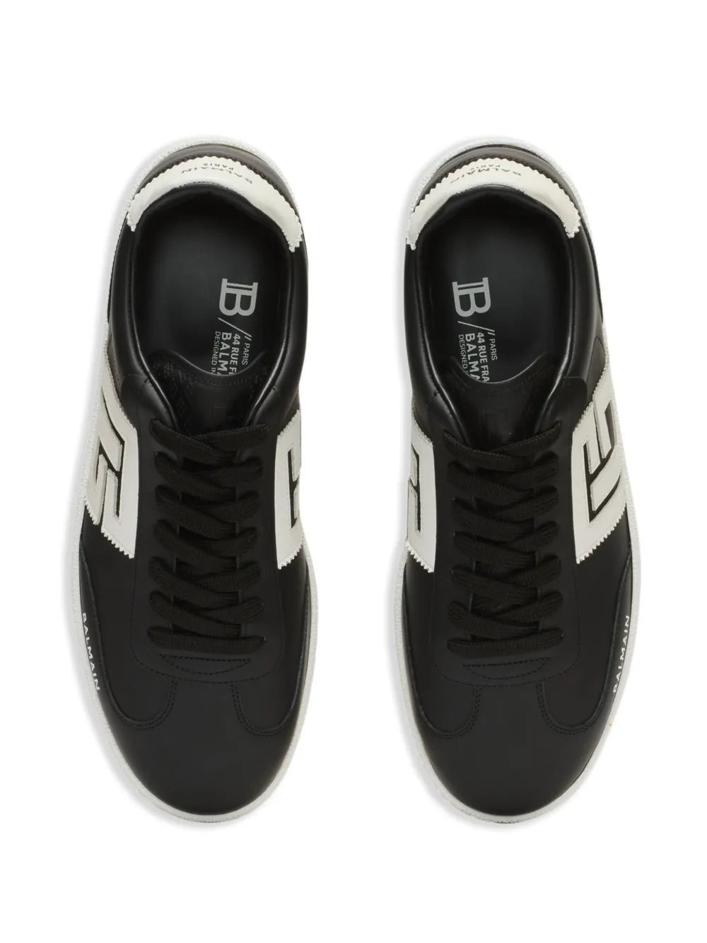 Pair of black lace-up sneakers with Balmain logo on the tongue