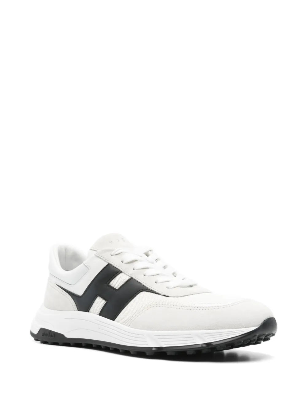 White lace-up sneakers with black side stripe and treaded rubber outsole