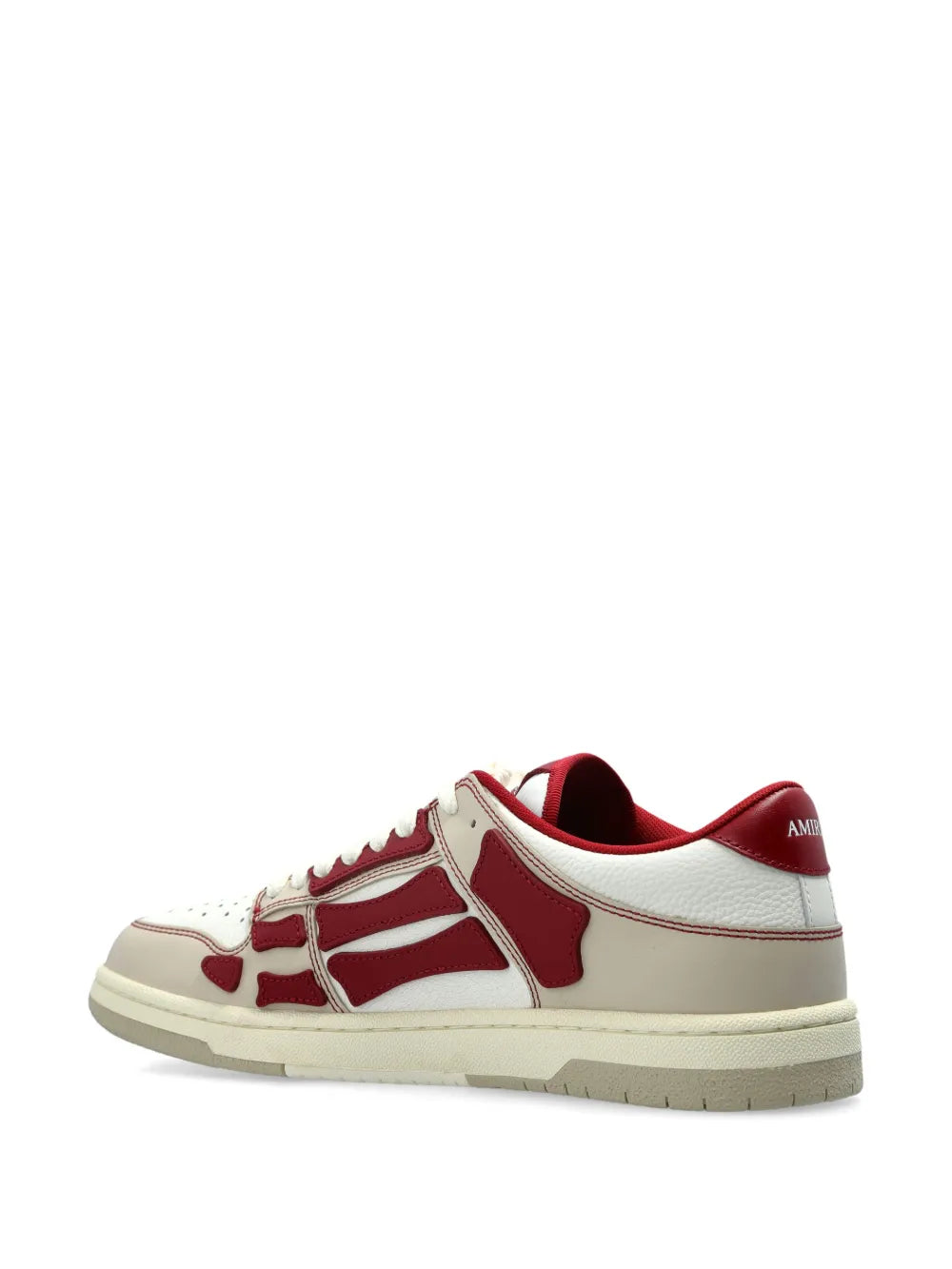 White and red lace-up sneakers, rear side view with red heel lining