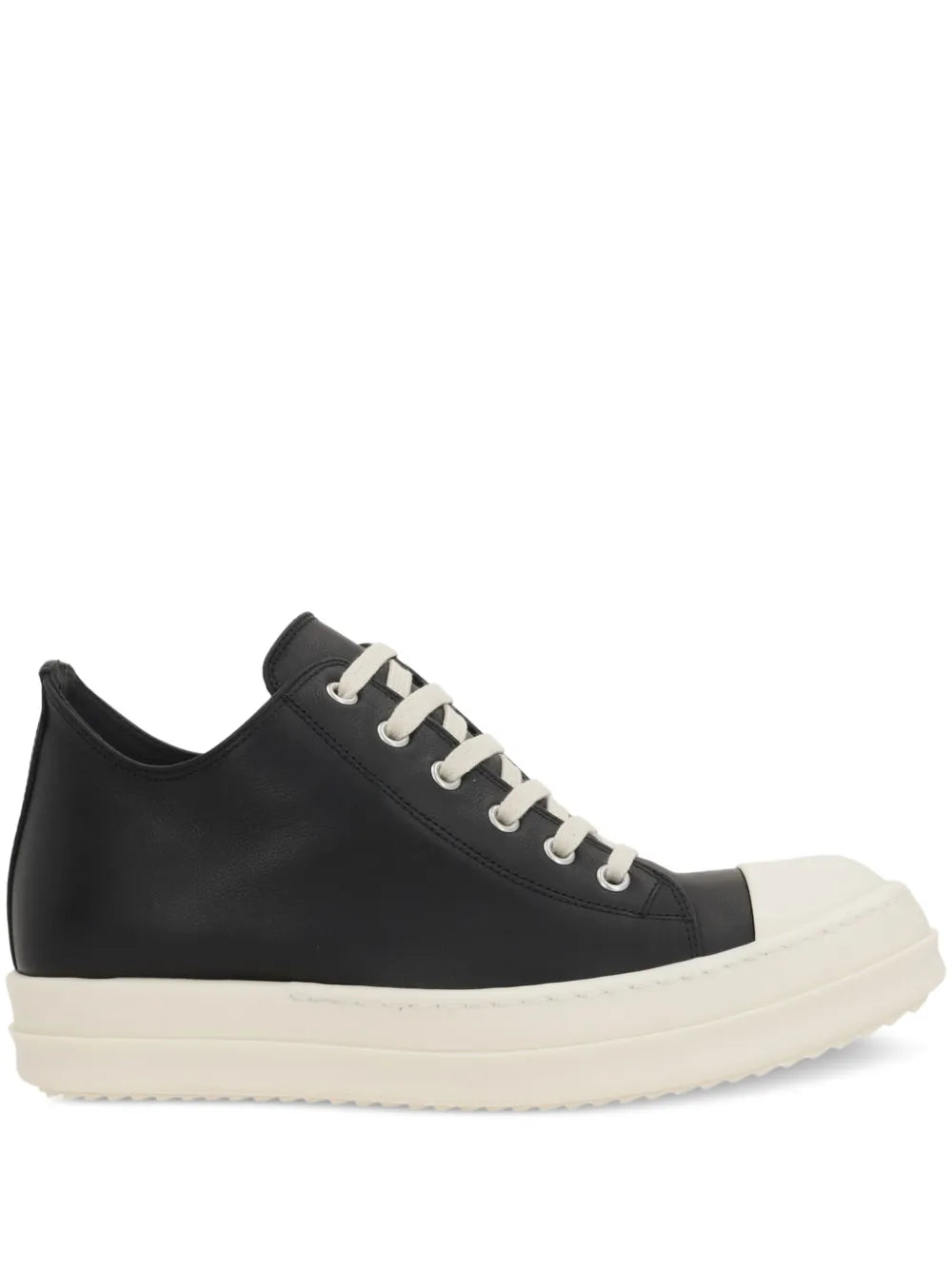 Black leather low-top sneakers with white rubber sole and lace-up eyelets