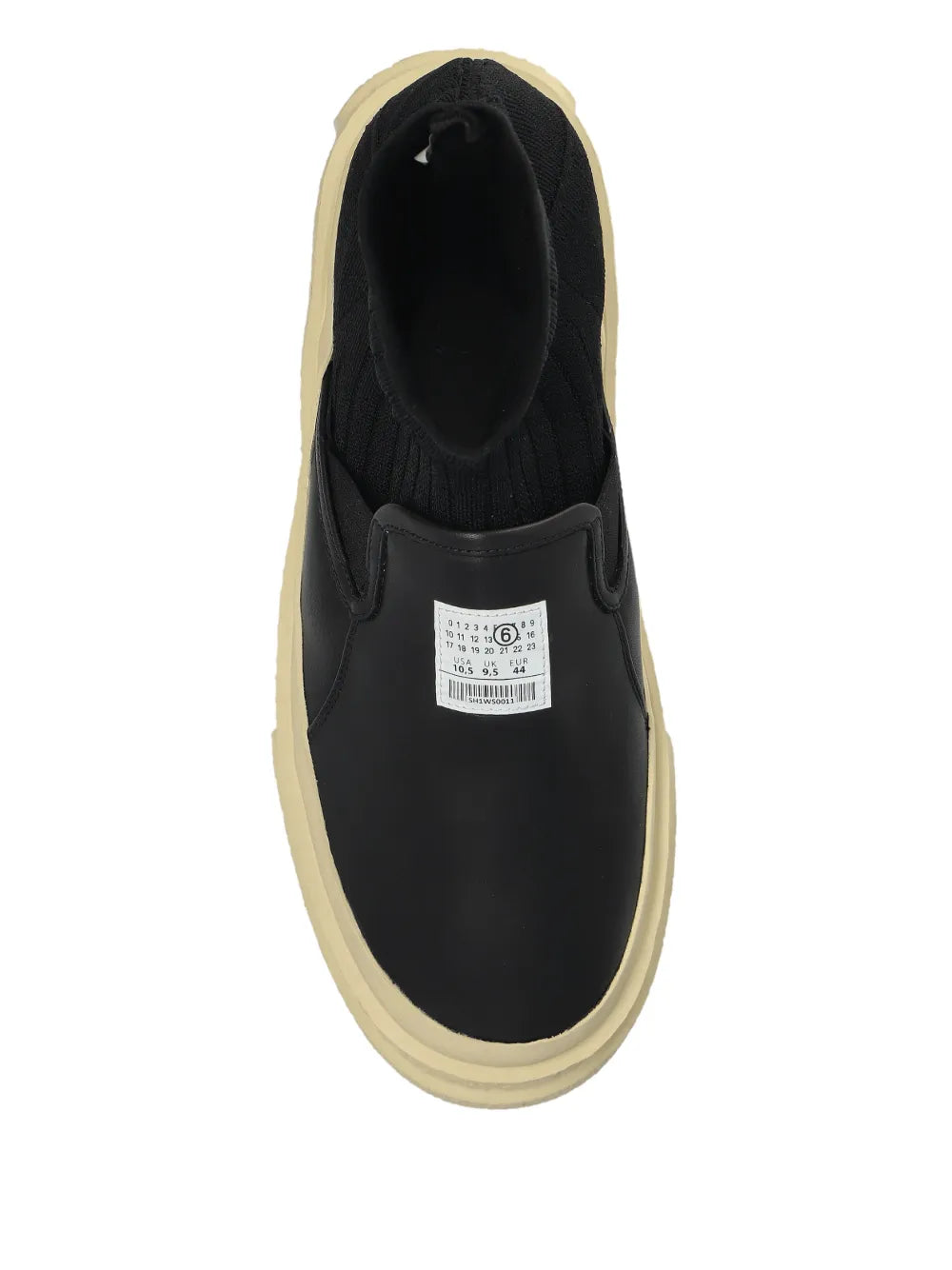 Black sock-insert sneaker showing inner opening and white size label, beige sole