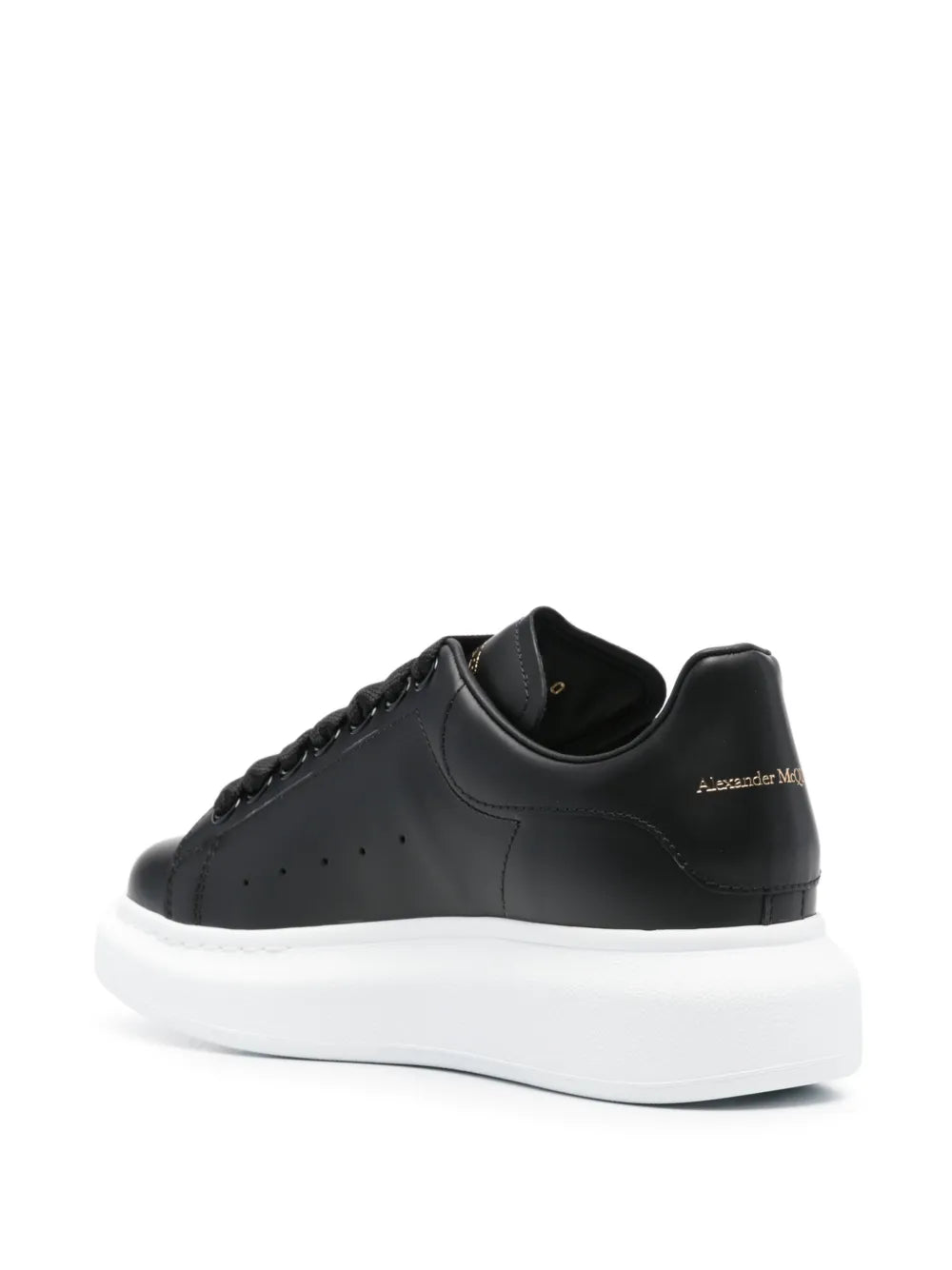 Black lace-up oversized sneaker with padded collar and Alexander McQueen logo on heel