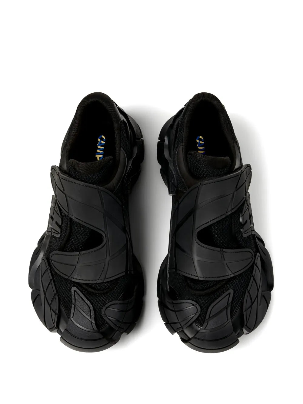 Black chunky sneakers with blue logo on lining, open-toe top view