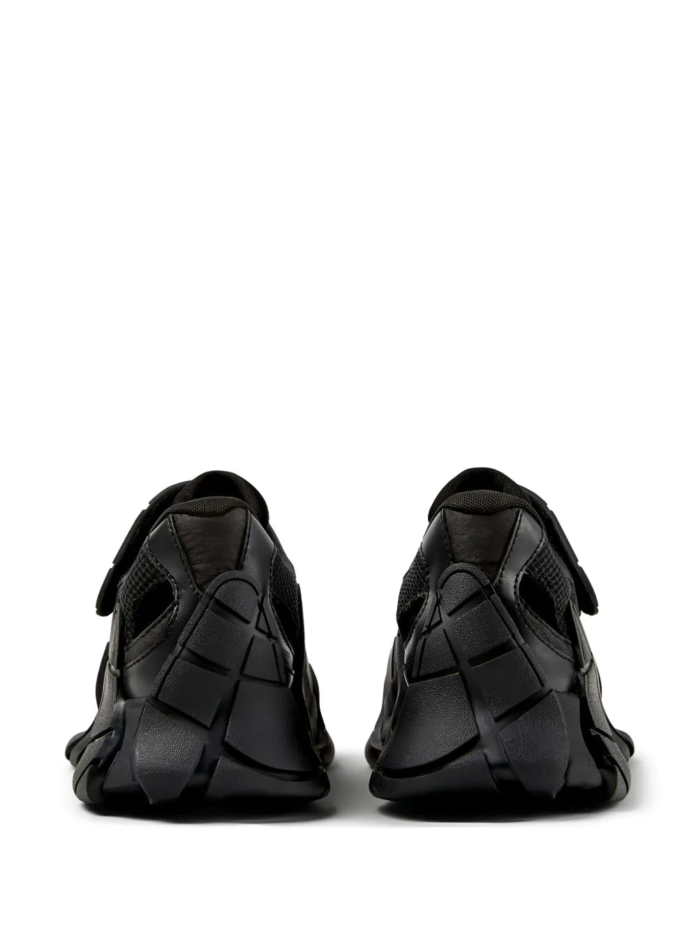 Black chunky sneakers with strap details, rear view