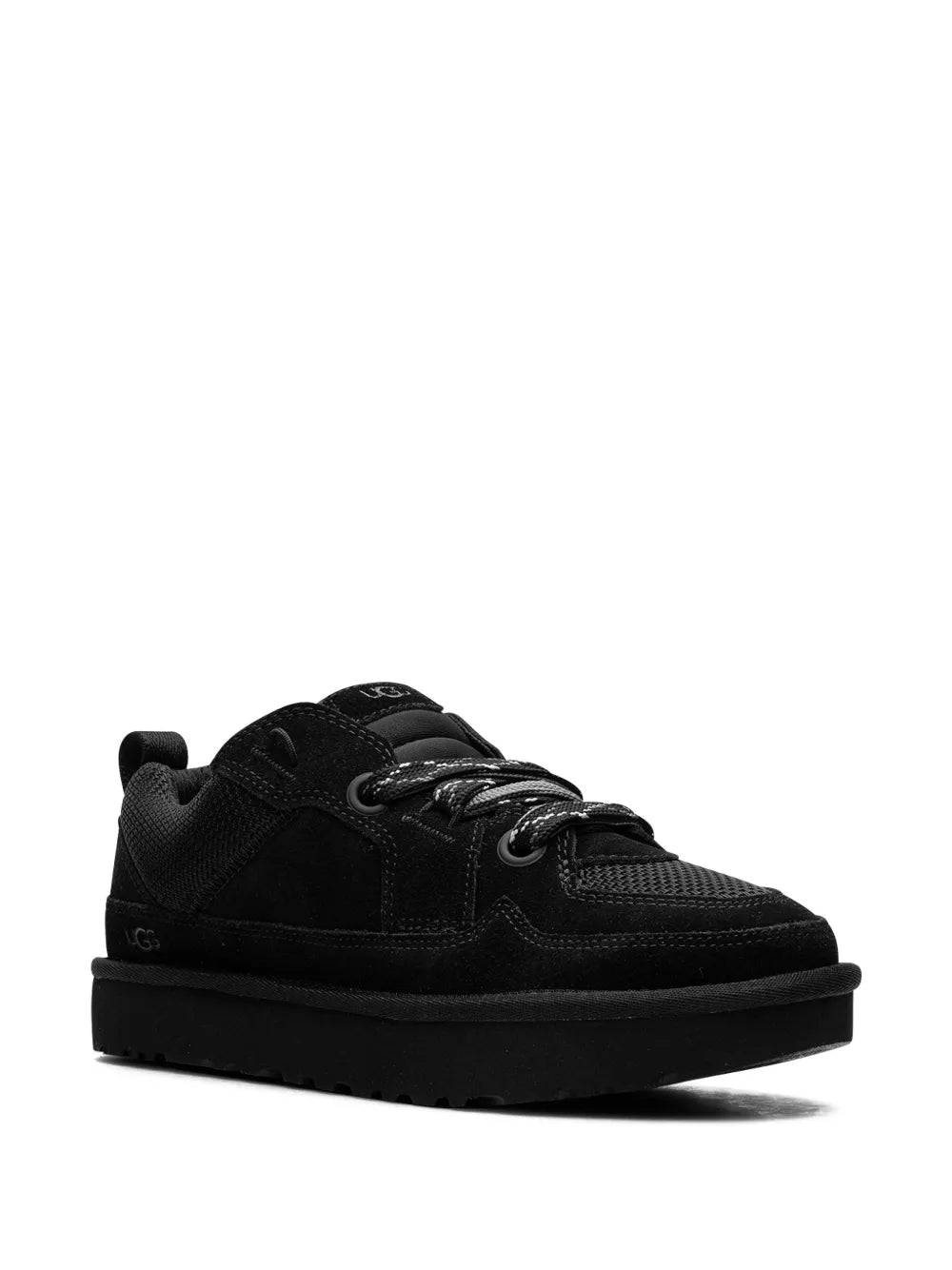 Black low-top lace-up sneaker, side view with rubber outsole and logo patch