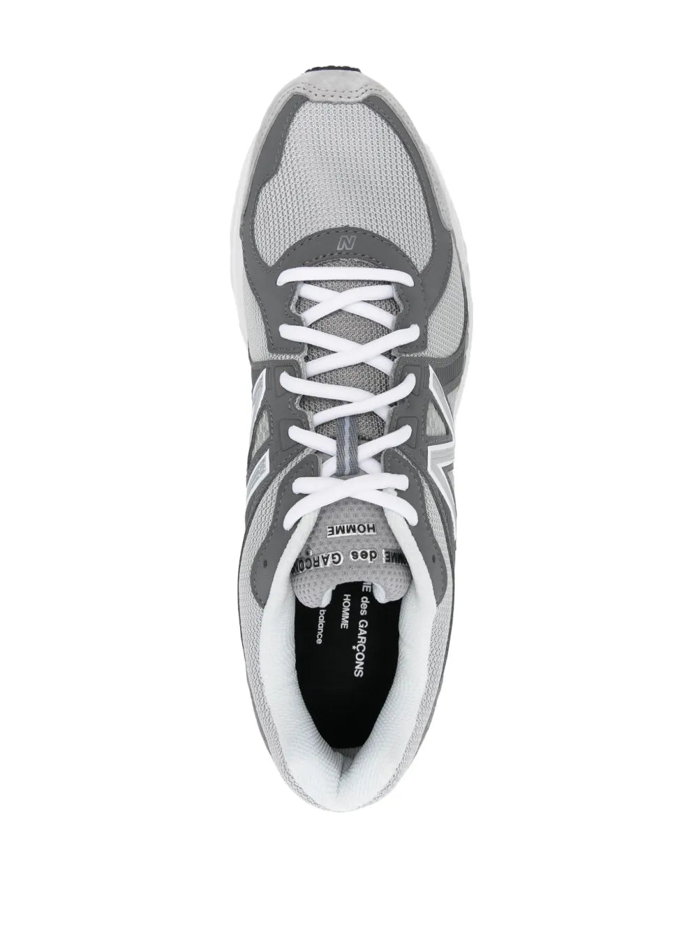 New Balance MR860 medium gray lace-up sneakers with padded tongue and visible insole