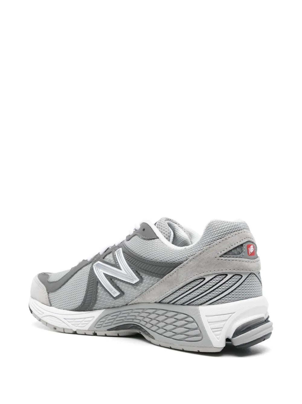 New Balance MR860 medium gray sneakers with textured heel and white rubber outsole