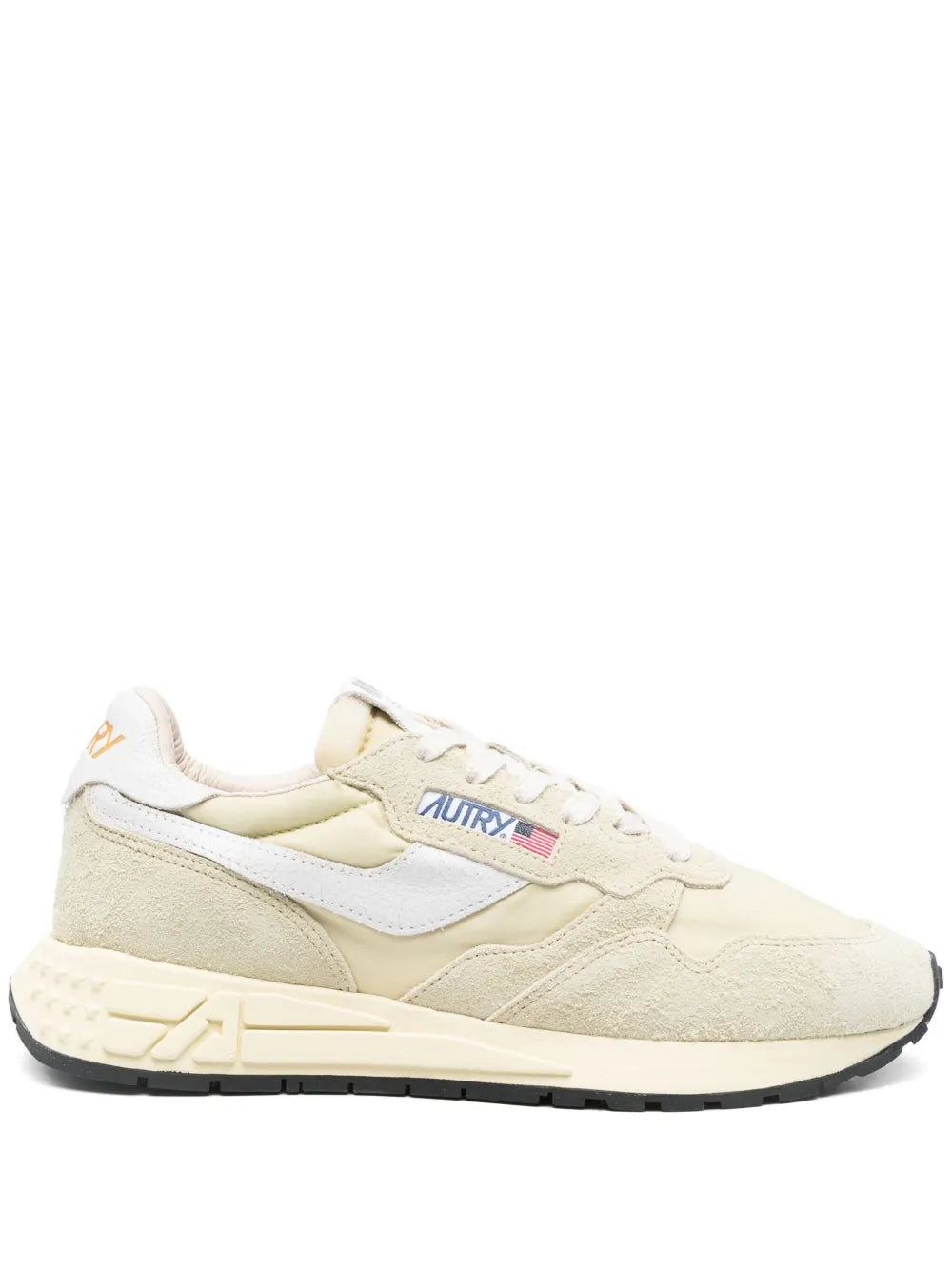 Light beige lace-up sneakers with contrasting white side panel and cream chunky sole