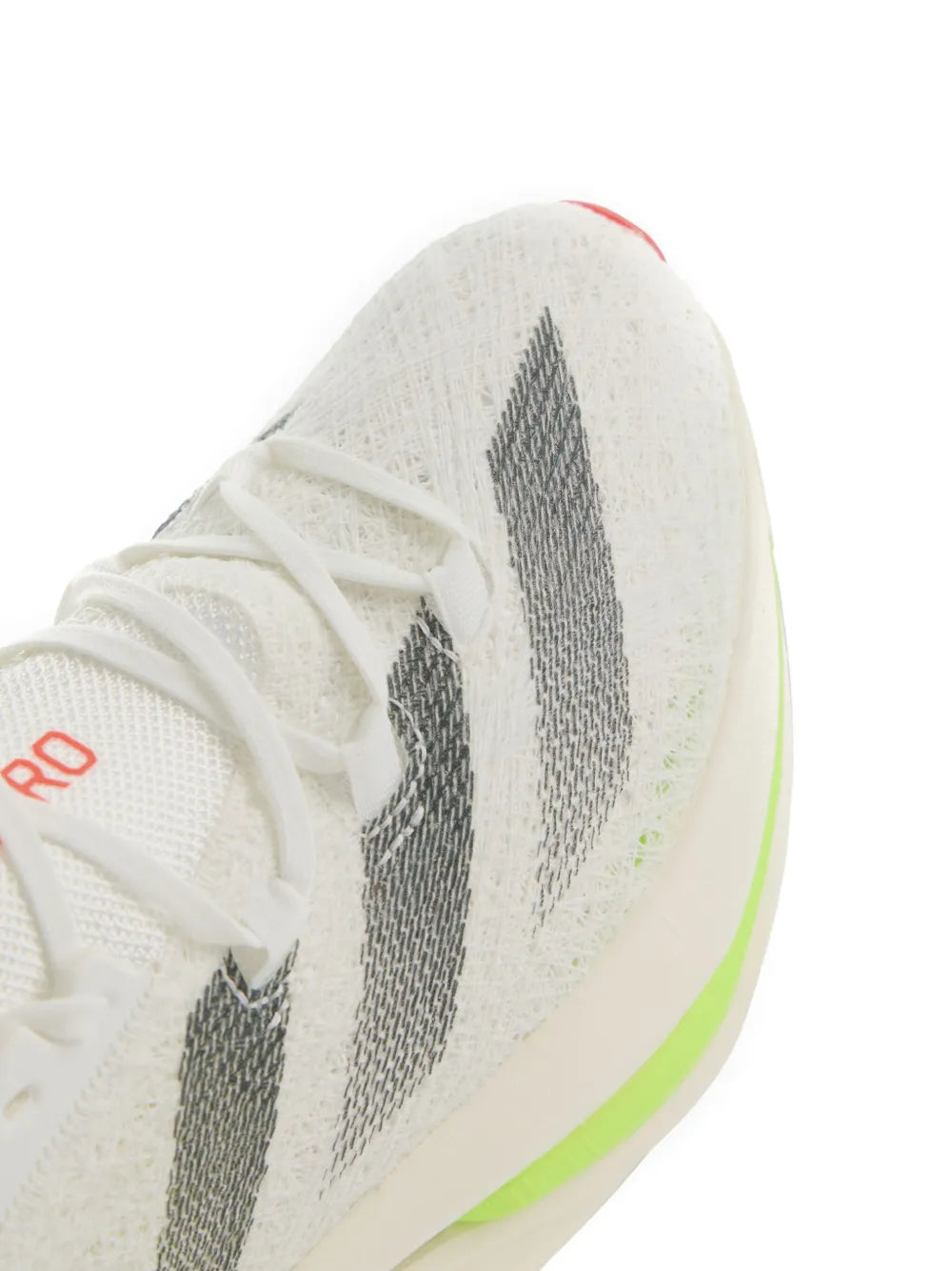 White knit upper detail with gray triple stripes and neon green midsole edge