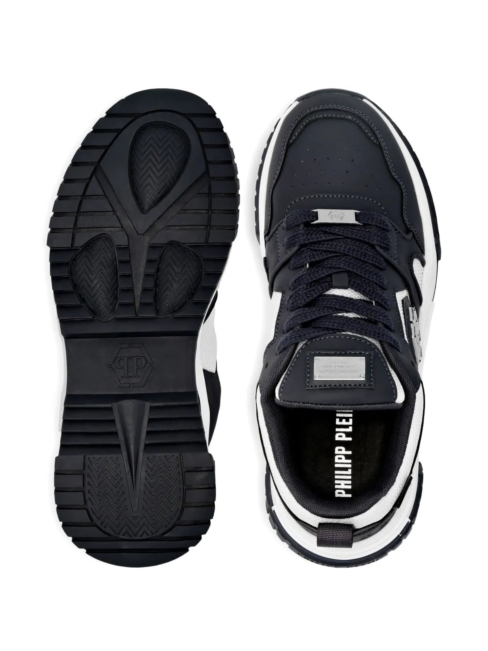 Pair of dark navy lace-up sneakers with white trim and treaded rubber outsole