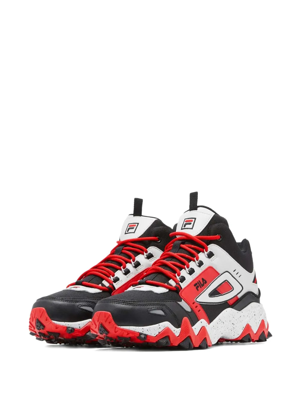 Black mid-top trail sneakers with white panels, red laces, and chunky zigzag tread sole.