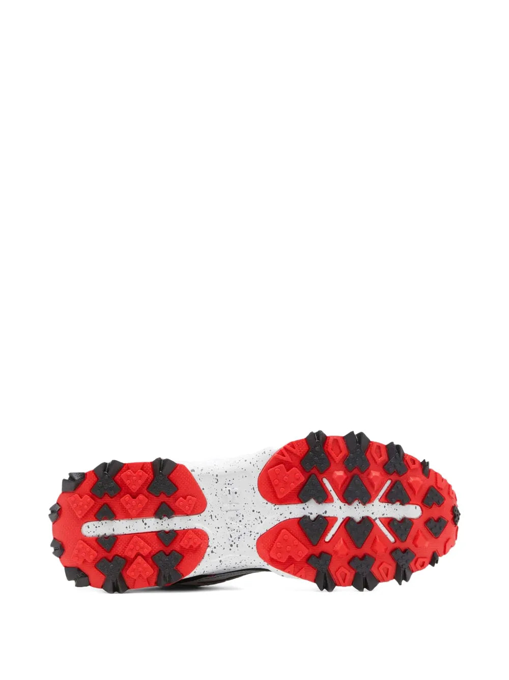 Red and black rugged outsole with deep tread on a white midsole.