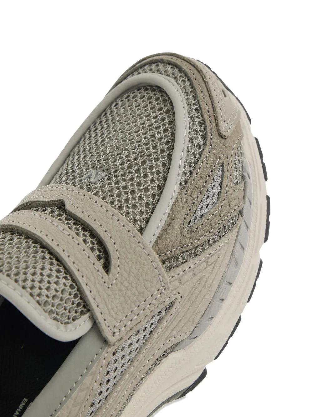 New Balance gray mesh slip-on trainer upper, close-up of strap and stitching