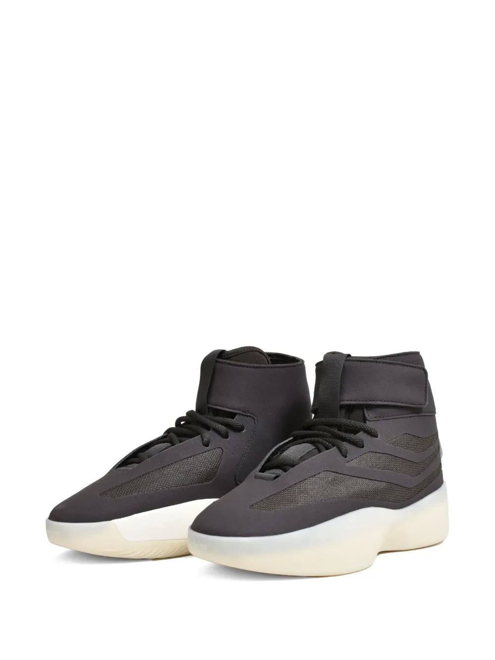 Black adidas mid-top sneakers with two-tone outsole and lace-up closure