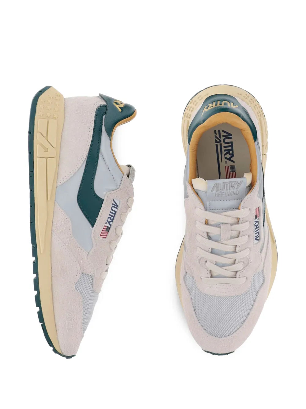 Light beige and gray low-top lace-up sneakers with teal side panels and chunky sole
