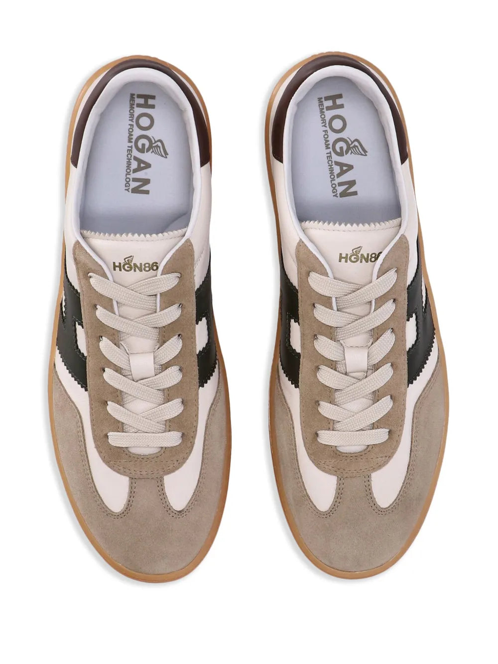 Hogan low-top leather sneakers, front view with laces and printed tongue logos; gum sole
