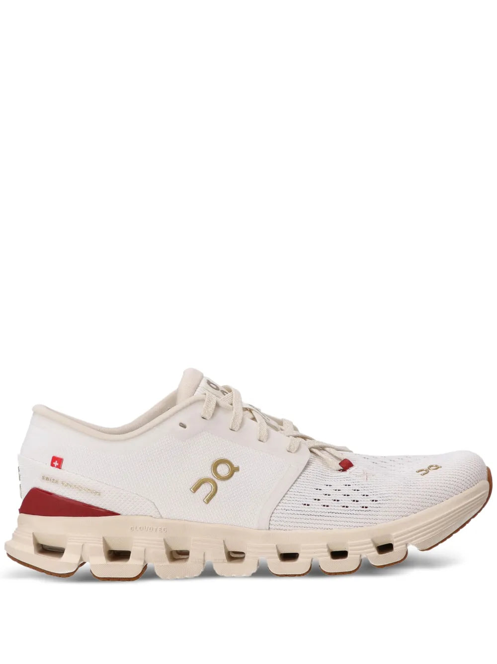 Beige/white running sneakers with red accents and Cloud-style sole