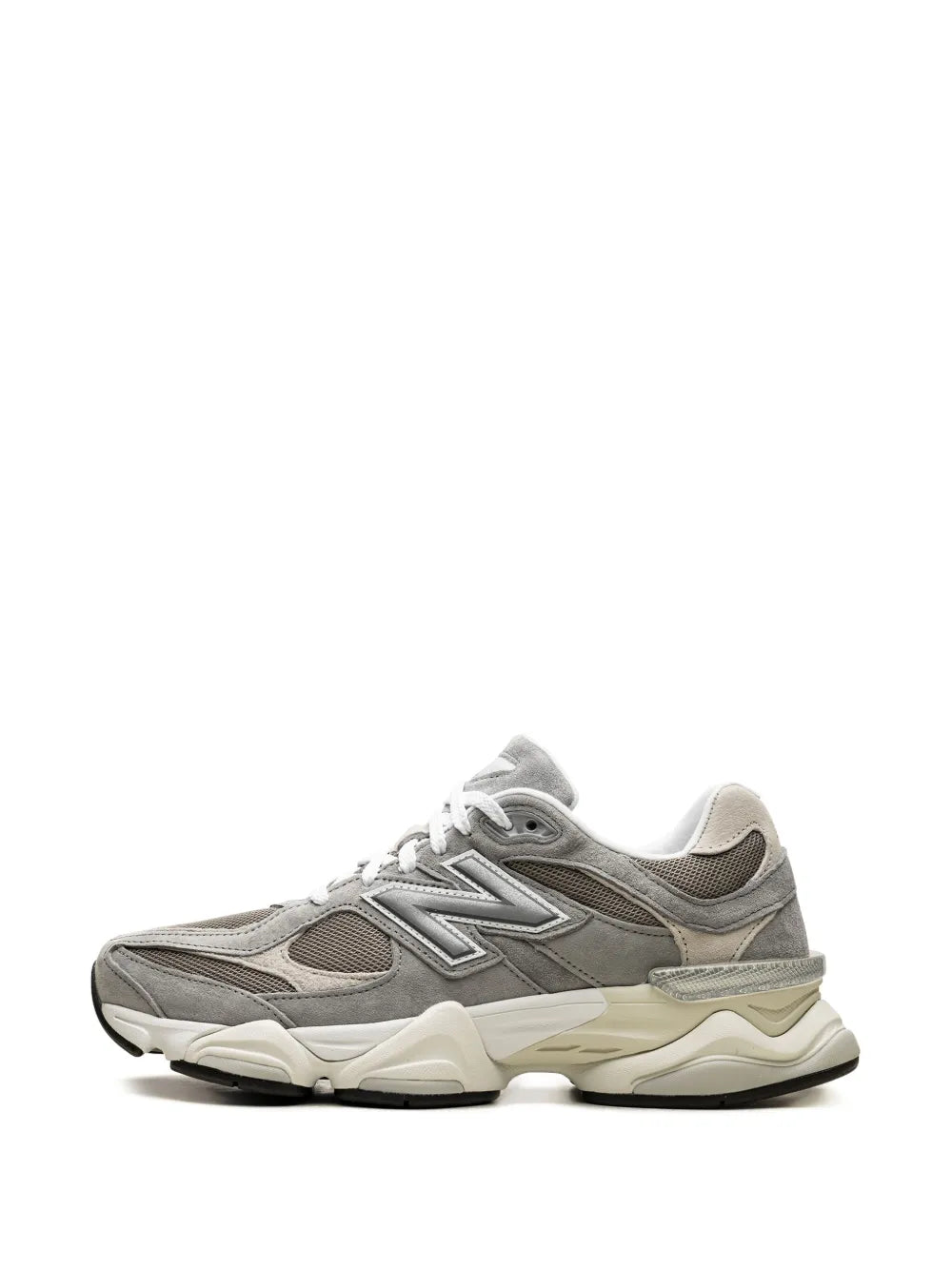 New Balance 9060 sneakers, grey panels with beige midsole, angled side view