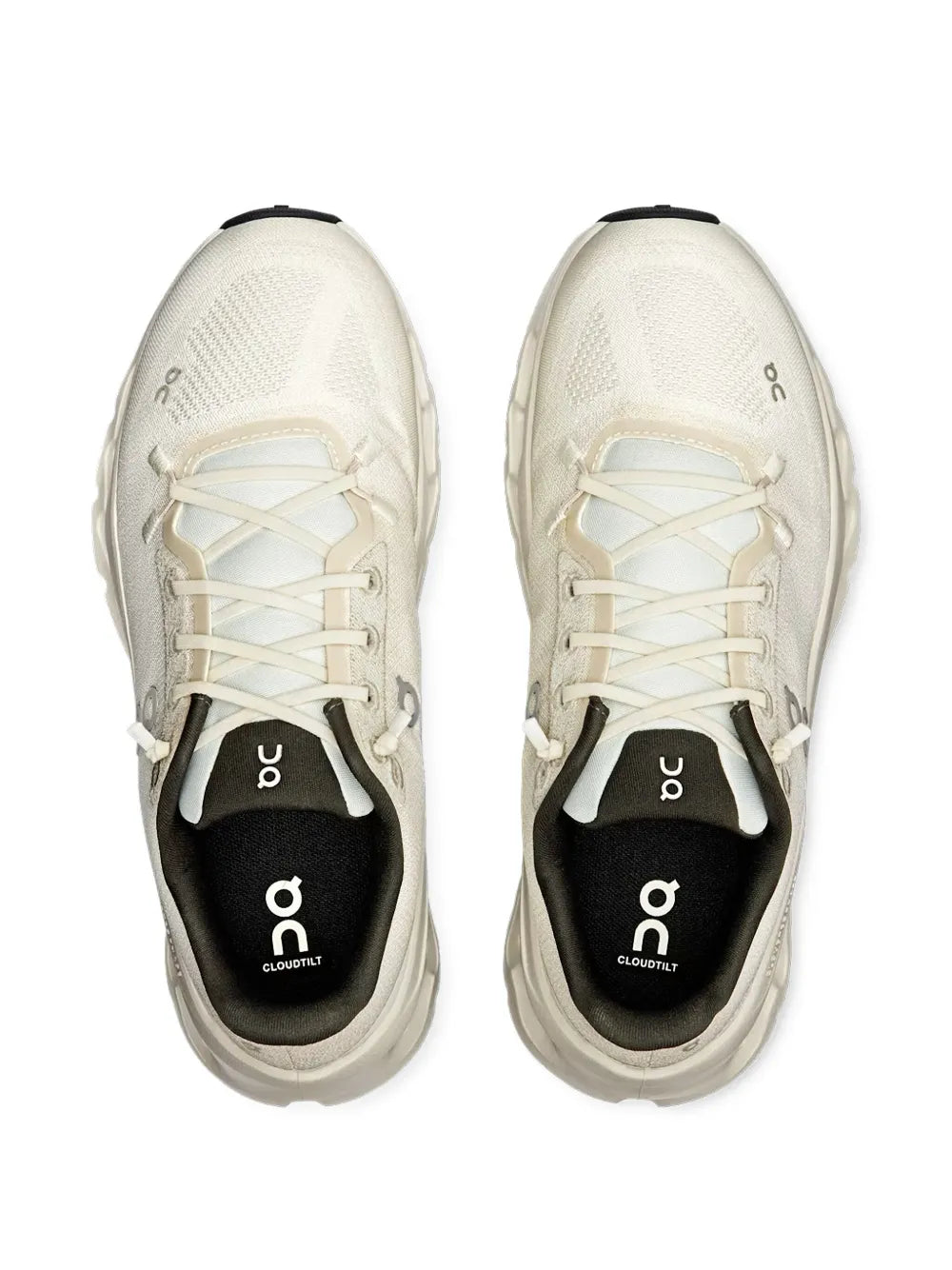 Beige knit running shoes, white laces, black interior collar, front view