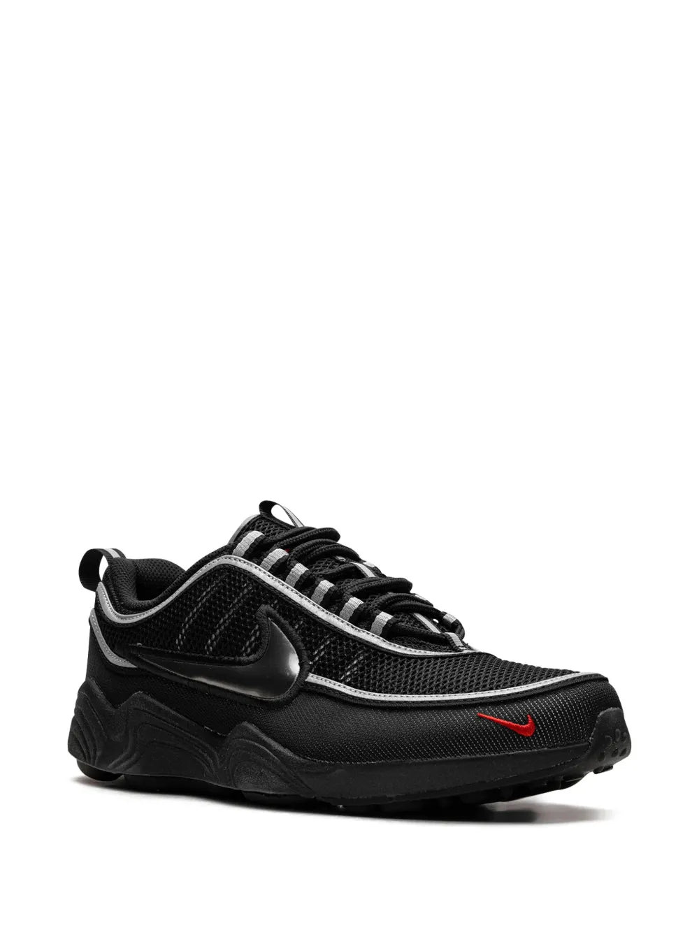 Black mesh athletic sneaker with lace-up front, Swoosh logo, and red detail