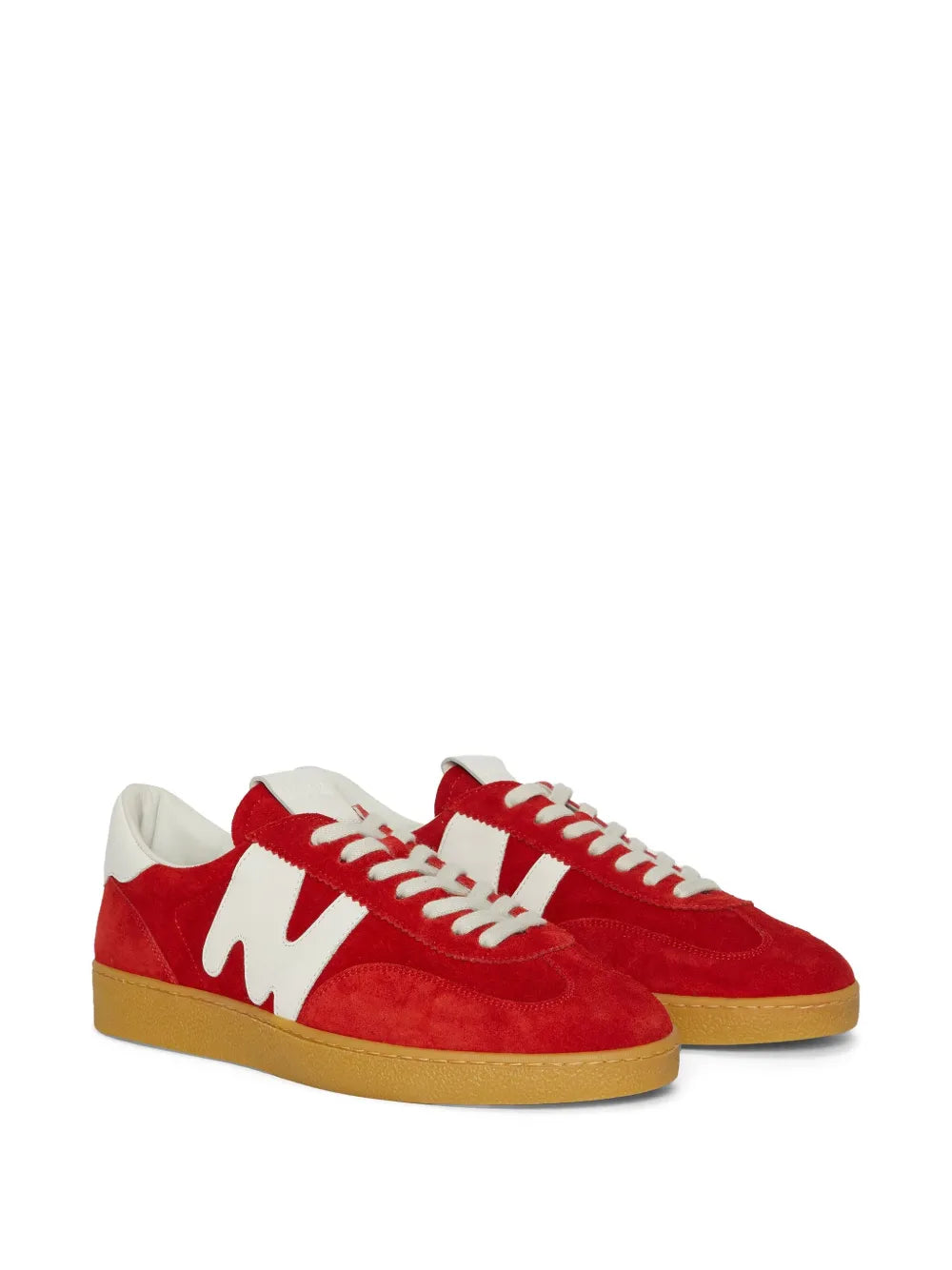 Red retro sneakers with white logo and laces, tan gum sole, angled side view