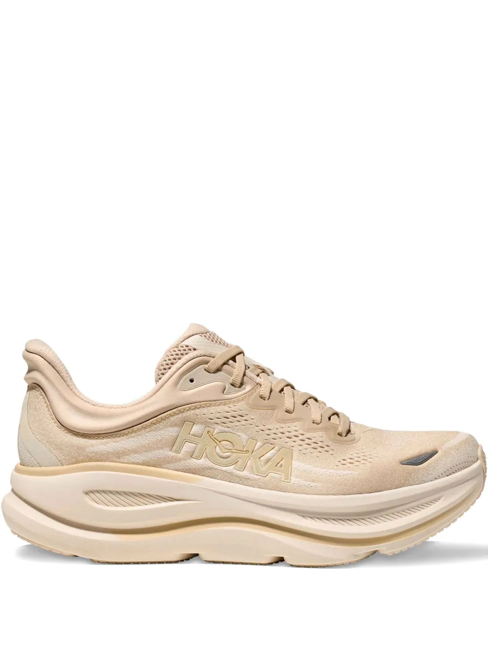 Beige Hoka lace-up sneakers with padded sole and side logo