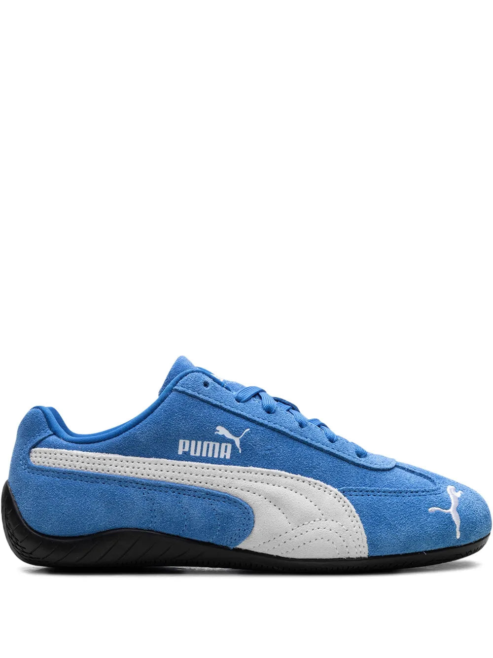 Blue and white low-top sneakers with Puma logo and black rubber outsole