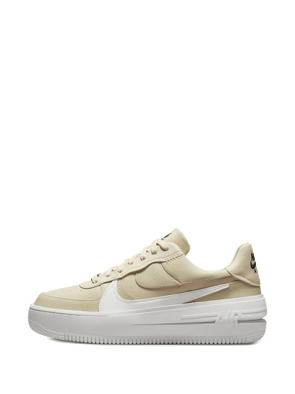 Beige lace-up low-top sneakers with white swoosh and thick sole