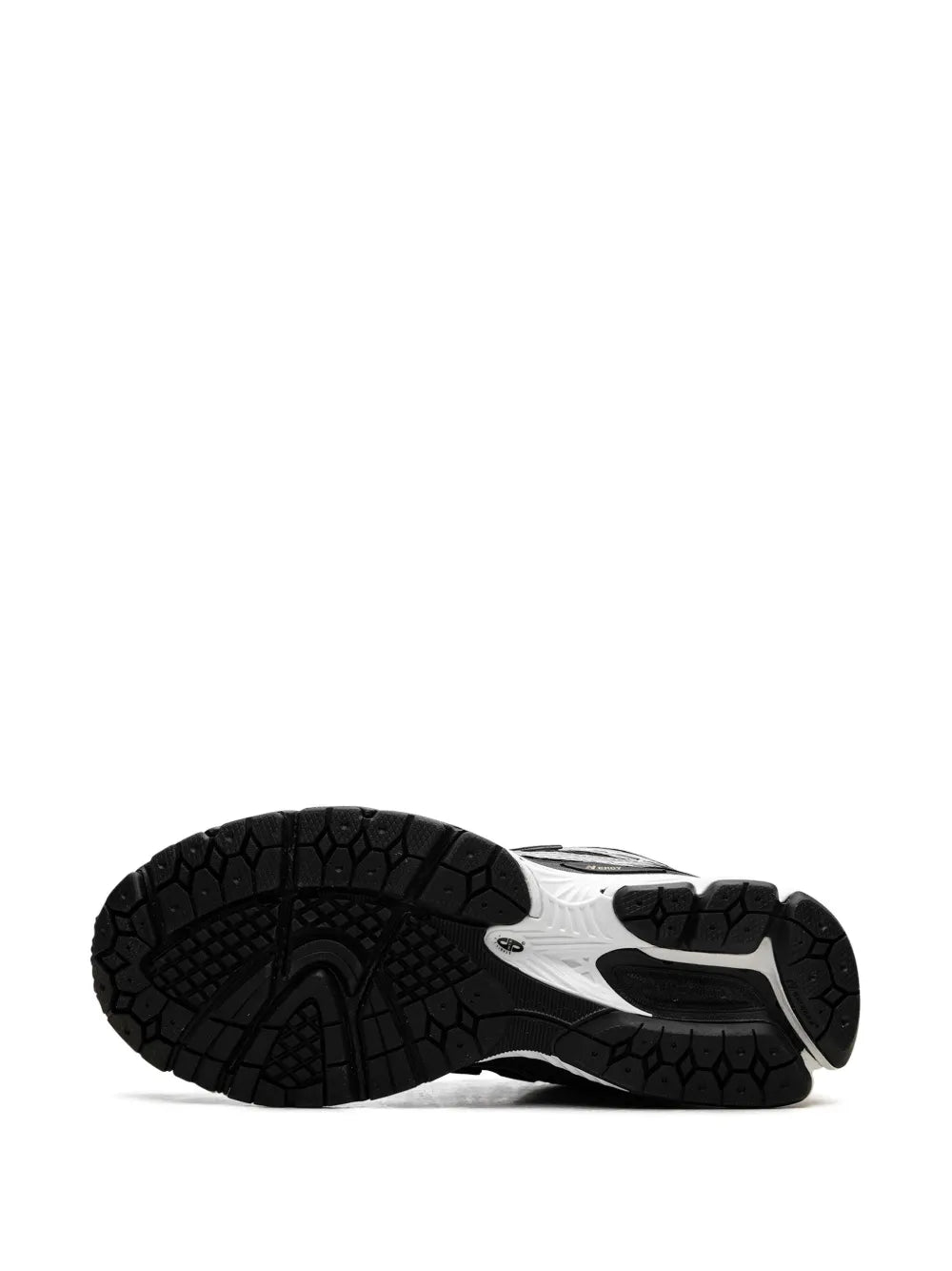 New Balance 1906R sneakers, outsole tread view with black rubber and white midsole