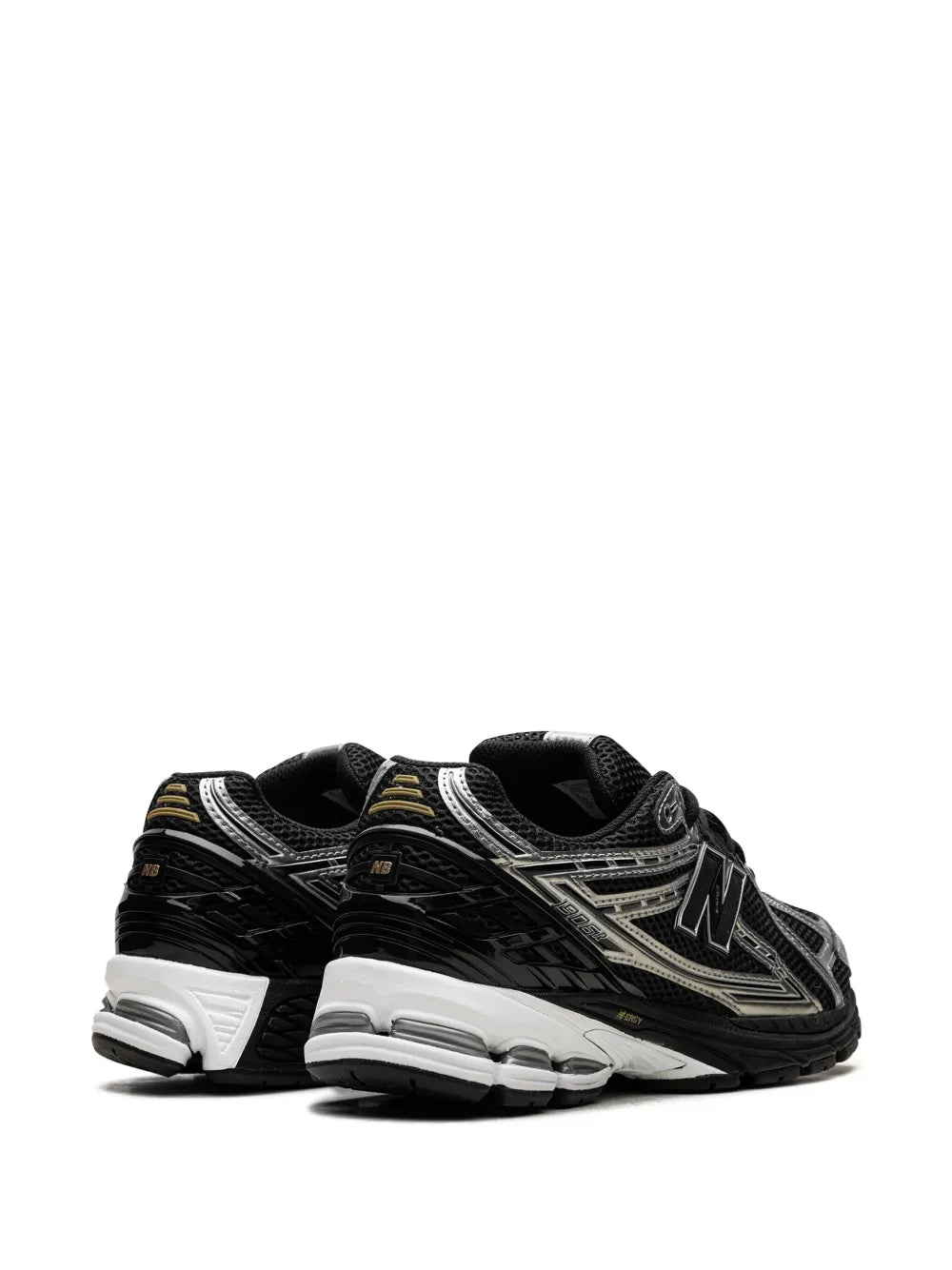 New Balance 1906R sneakers, rear/side view with black collar and cushioned sole