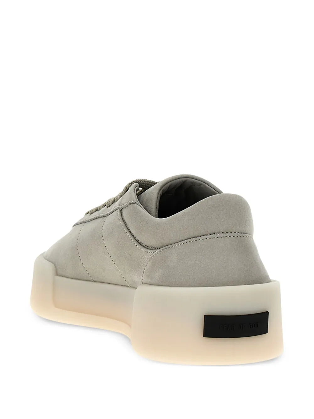 Light grey low-top lace-up sneakers with off-white sole and heel label
