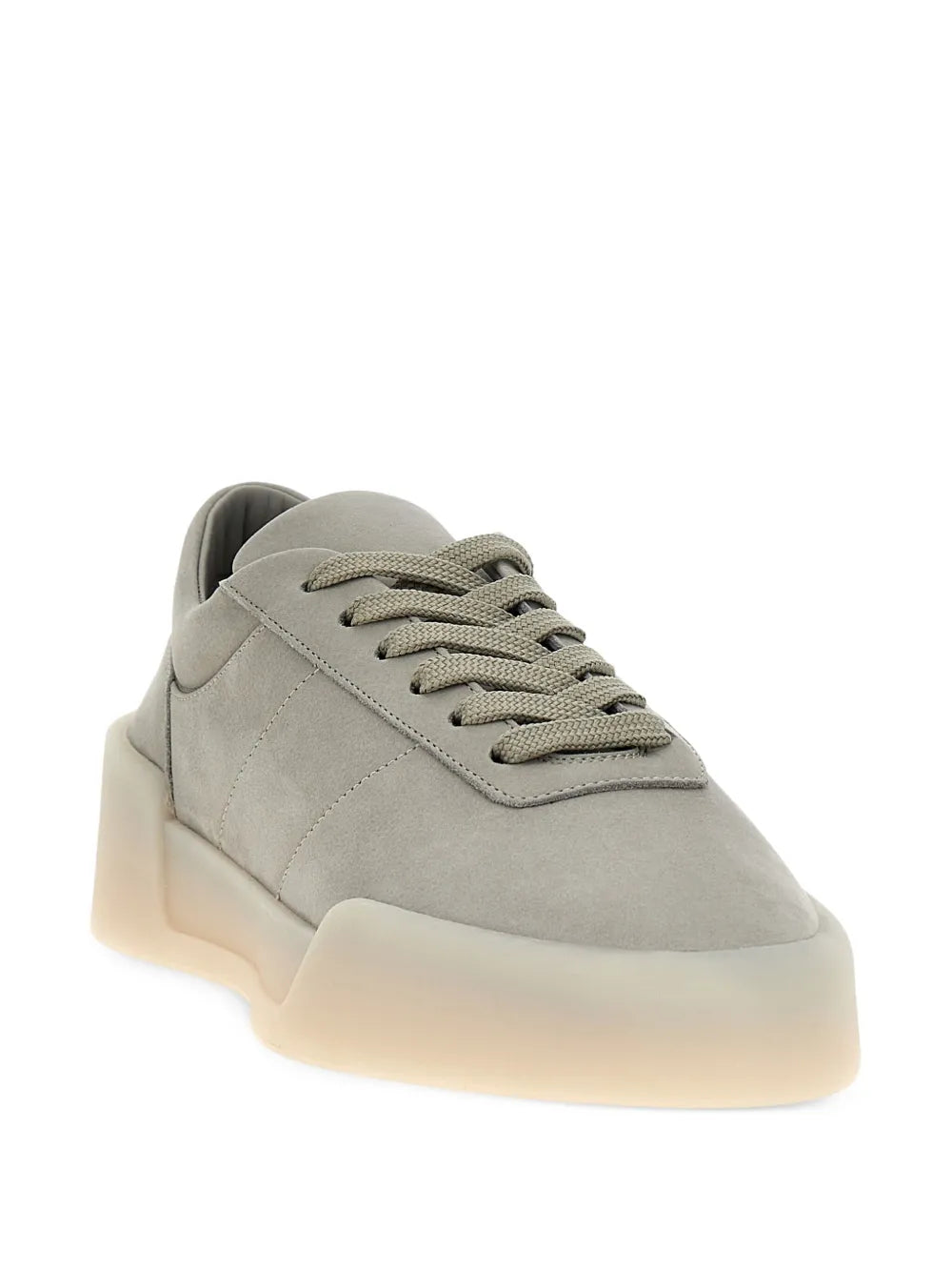 Light grey low-top lace-up sneakers, side profile with chunky off-white sole