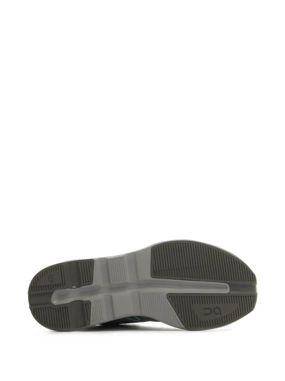 Grey running shoe outsole with textured traction tread and central flex groove