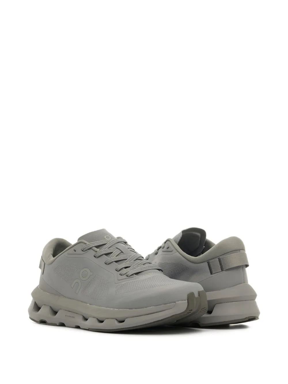 Grey lace-up running sneaker with heel pull tab and chunky midsole