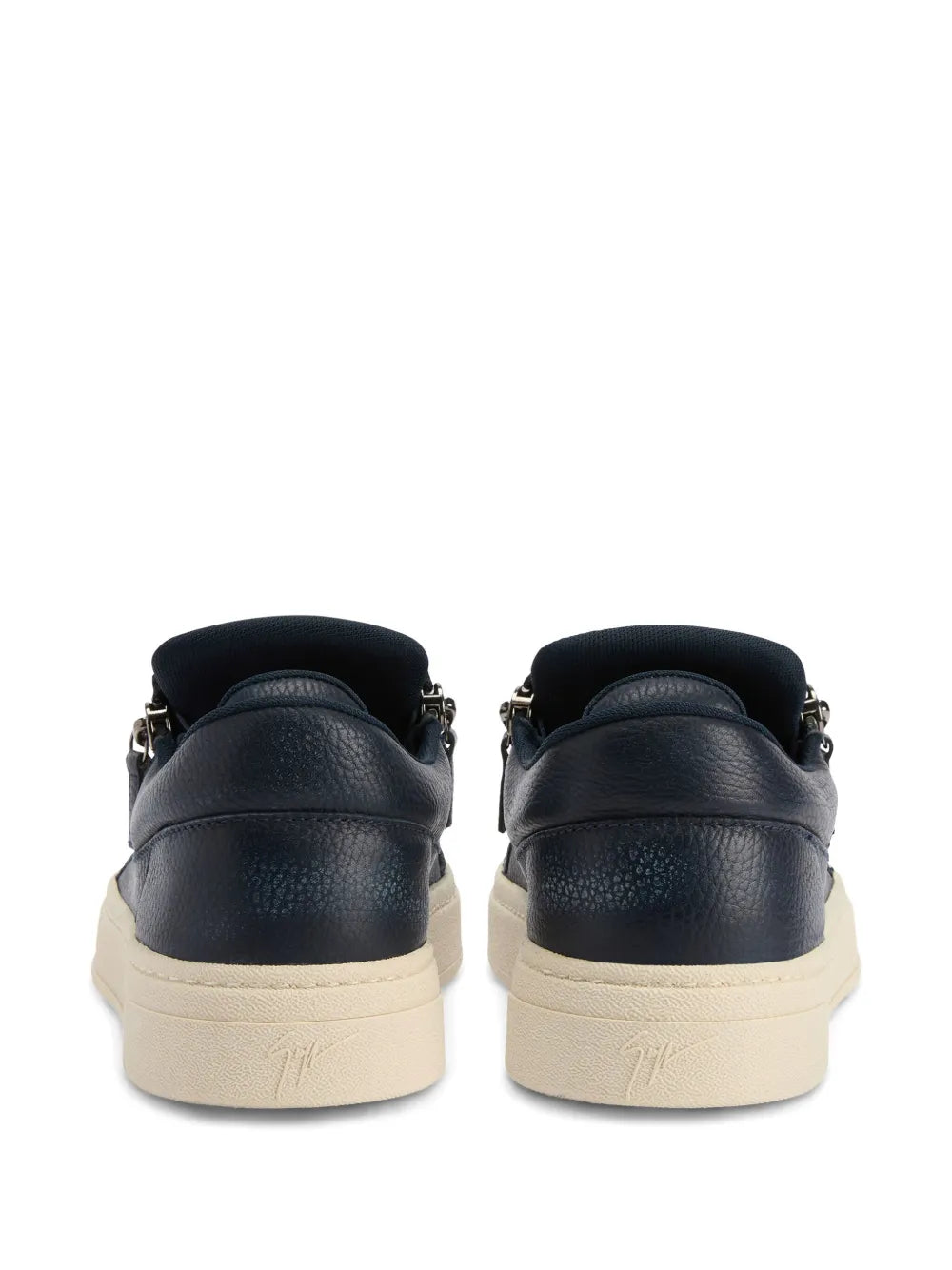 Navy leather low-top sneakers, dual heel zippers, beige rubber outsole, rear tabs