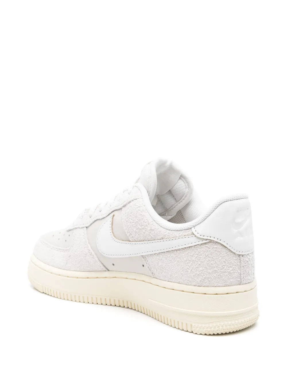 Nike Air Force 1 low-top sneakers, heel and collar view in white leather with light grey