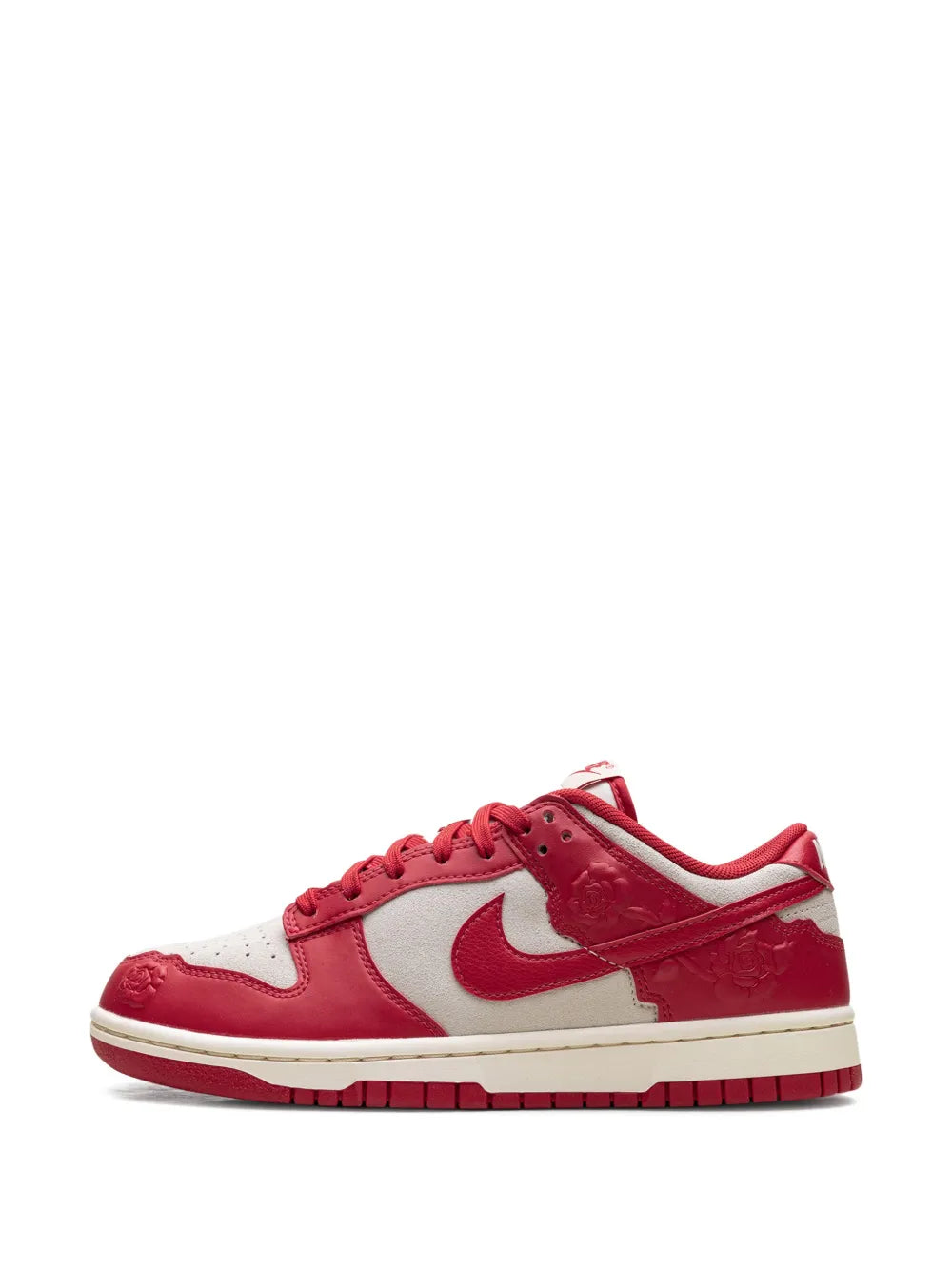 Red and white low-top sneaker with Nike swoosh and lace-up front.