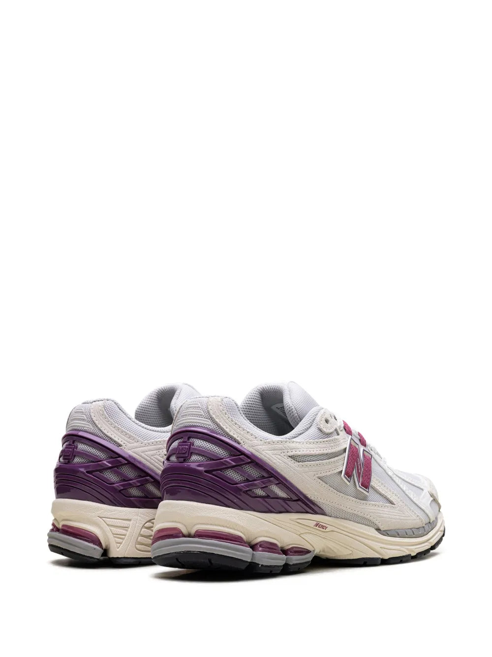 New Balance 1906R sneakers, side view with purple heel and beige midsole
